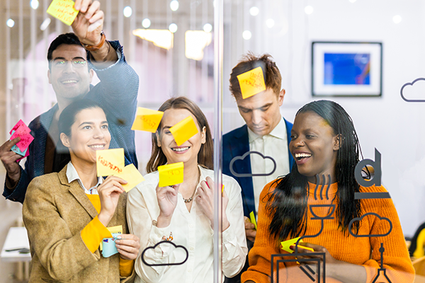 business team brainstorms with sticky notes